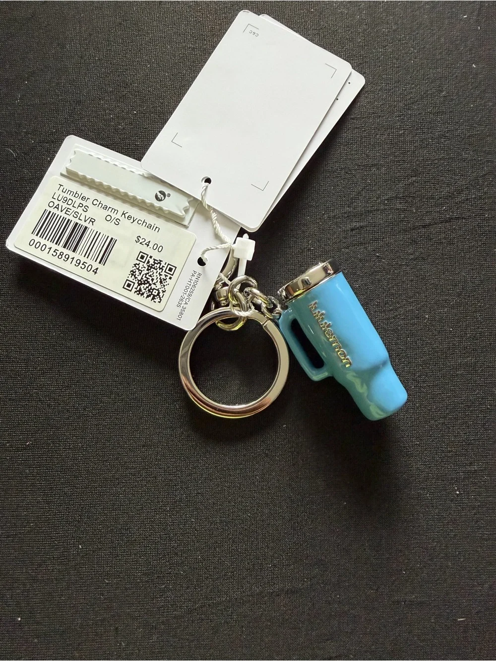 Lululemon blue tumbler charm keychain with silver hardware